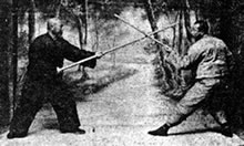 T'ien Chao Ling and Tung Ying Chieh Practicing Spear Set with Short Staff